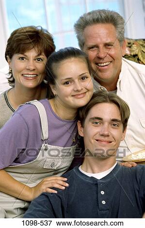 people, smiling, sitting, family, portrait, indoors, Caucasian View Large Photo Image Stock Photo - people, smiling, sitting, family, portrait, indoors, Caucasian. Fotosearch