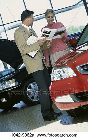 people, smiling, talking, couple, conversation, car, reading View Large Photo Image Stock Image - people, smiling, talking, couple, conversation, car, reading. Fotosearch