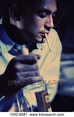 people, smoke, bottle, Hispanic, cigarette, drinking View Large Photo Image Stock Image - people, smoke, bottle, Hispanic, cigarette, drinking. Fotosearch