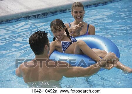 people, swim, floating, water, pool, swimming View Large Photo Image Stock Image - people, swim, floating, water, pool, swimming. Fotosearch