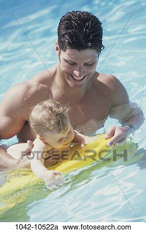 Stock Image - people, swim, floating, water, pool, smiling, baby. Fotosearch