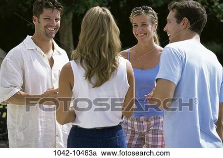 people, talking, couple, outdoors, friends, social View Large Photo Image Stock Image - people, talking, couple, outdoors, friends, social. Fotosearch