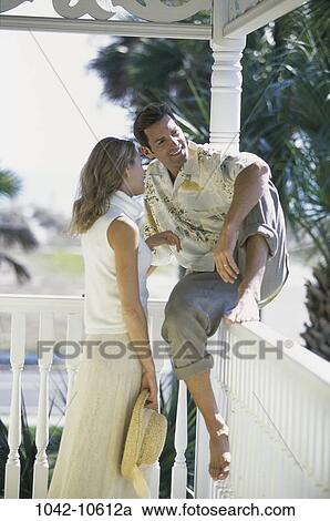 people, talking, couple, outdoors, porch, Caucasian View Large Photo Image Stock Image - people, talking, couple, outdoors, porch, Caucasian. Fotosearch