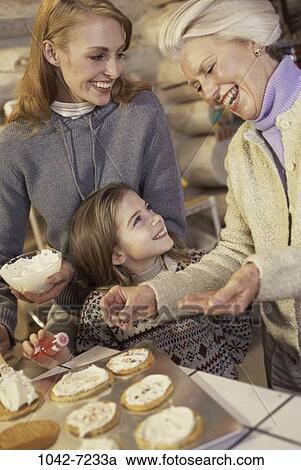 people, talking, mother, cooking, laughing, spread, family View Large Photo Image Stock Image - people, talking, mother, cooking, laughing, spread, family. Fotosearch