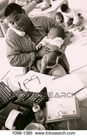 people, telephone, calculator, eyeglasses, busy, papers, baby View Large Photo Image Stock Photography - people, telephone, calculator, eyeglasses, busy, papers, baby. Fotosearch