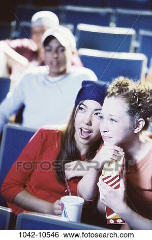 people, theater, arts, entertainment, watching, friends, teens View Large Photo Image Stock Photograph - people, theater, arts, entertainment, watching, friends, teens. Fotosearch