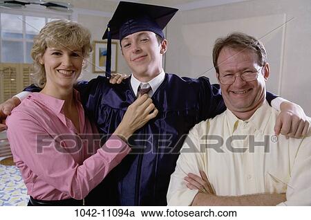 people, tie, smiling, achievement, cap, smile, family View Large Photo Image Stock Image - people, tie, smiling, achievement, cap, smile, family. Fotosearch