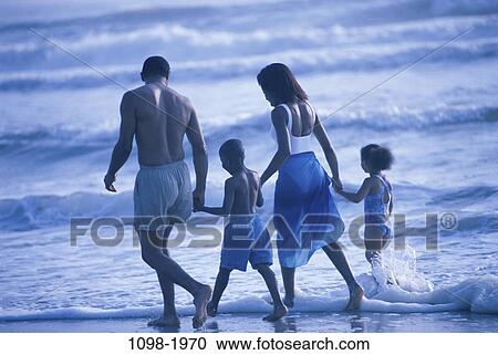 people, walking, beach, family, vacation, affection, parents View Large Photo Image Stock Image - people, walking, beach, family, vacation, affection, parents. Fotosearch