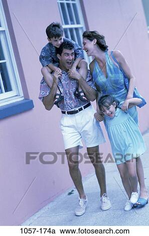 people, walking, talking, Hispanic, outdoors, family, sidewalk View Large Photo Image Stock Image - people, walking, talking, Hispanic, outdoors, family, sidewalk. Fotosearch