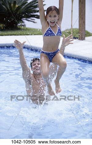 people, water, pool, smiling, splash, outdoors, splashing View Large Photo Image Stock Photography - people, water, pool, smiling, splash, outdoors, splashing. Fotosearch