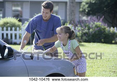 people, water, smiling, car, scrubbing, outdoors View Large Photo Image Stock Photograph - people, water, smiling, car, scrubbing, outdoors. Fotosearch