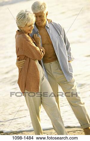 people, water, smiling, walking, couple, senior, beach View Large Photo Image Picture - people, water, smiling, walking, couple, senior, beach. Fotosearch