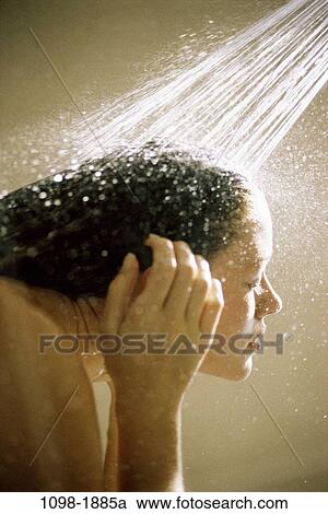 Stock Image - people, water, woman, Hispanic, stream, hair, cleaning. Fotosearch
