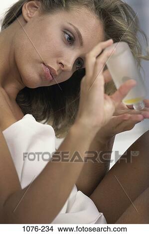 people, woman, bottle, pouring, watch, oil, watching View Large Photo Image Picture - people, woman, bottle, pouring, watch, oil, watching. Fotosearch