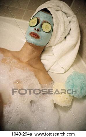 people, woman, cucumber, bubbles, mask, relaxing, towel View Large Photo Image Stock Image - people, woman, cucumber, bubbles, mask, relaxing, towel. Fotosearch