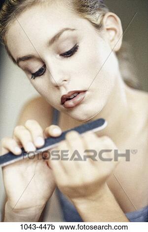 people, woman, face, concentration, concentrating, beauty, brunette View Large Photo Image Stock Image - people, woman, face, concentration, concentrating, beauty, brunette. Fotosearch