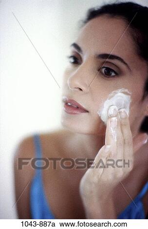 people, woman, face, Hispanic, mirror, indulgence, lotion View Large Photo Image Stock Image - people, woman, face, Hispanic, mirror, indulgence, lotion. Fotosearch
