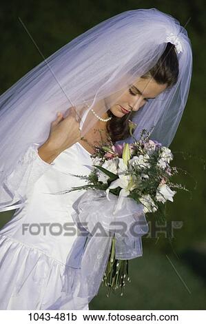 people, woman, formal, flowers, dress, outdoors, wedding View Large Photo Image Stock Image - people, woman, formal, flowers, dress, outdoors, wedding. Fotosearch
