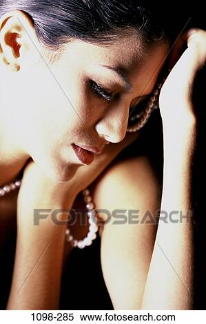 people, woman, pensive, Hispanic, pearls, jewelry, necklace View Large Photo Image Stock Photography - people, woman, pensive, Hispanic, pearls, jewelry, necklace. Fotosearch