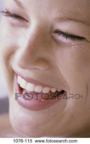 people, woman, smiling, face, laughing, smile, beauty View Large Photo Image Stock Photography - people, woman, smiling, face, laughing, smile, beauty. Fotosearch