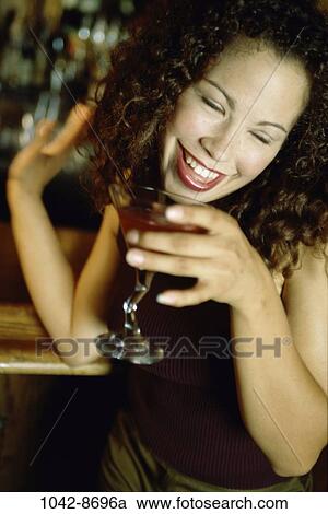 people, woman, smiling, Hispanic, drinking, happy, bar View Large Photo Image Stock Image - people, woman, smiling, Hispanic, drinking, happy, bar. Fotosearch