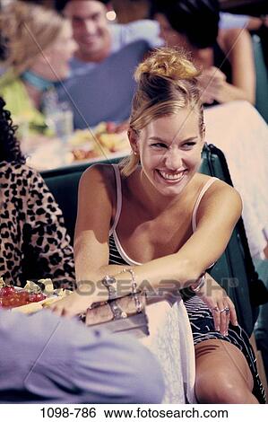 people, woman, smiling, sitting, happy, women indoors, dining out View Large Photo Image Stock Photograph - people, woman, smiling, sitting, happy, women indoors, dining out. Fotosearch