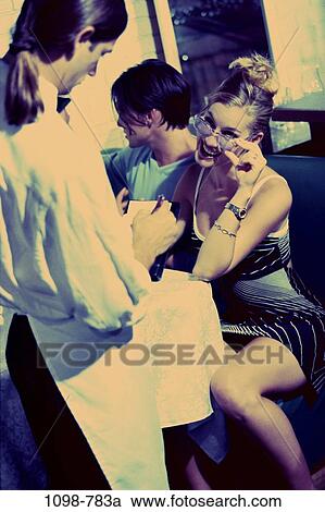 people, woman, smiling, table, eyeglasses, flirting View Large Photo Image Stock Image - people, woman, smiling, table, eyeglasses, flirting. Fotosearch