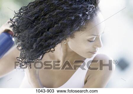 Stock Image - people, woman, spraying, hair, beauty, spray. Fotosearch