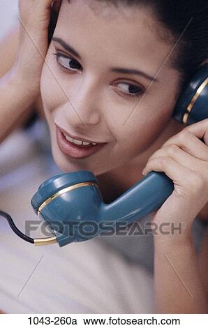 people, woman, telephone, talking, conversation, Hispanic, phone View Large Photo Image Stock Image - people, woman, telephone, talking, conversation, Hispanic, phone. Fotosearch