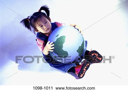 Stock Image - people, world, globe, Asian, ball, girl, pigtails. Fotosearch