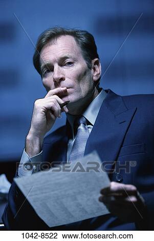 reading, thought, business, contemplation, contemplating, thinking, businessman View Large Photo Image Stock Image - reading, thought, business, contemplation, contemplating, thinking, businessman. Fotosearch
