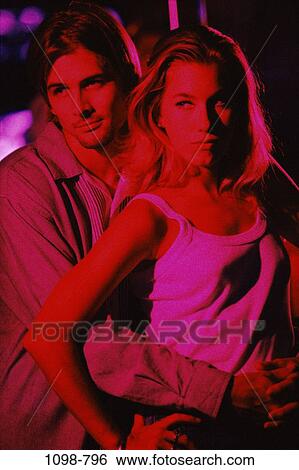 red, people, couple, hugging, serious, nightlife, touching View Large Photo Image Stock Photograph - red, people, couple, hugging, serious, nightlife, touching. Fotosearch