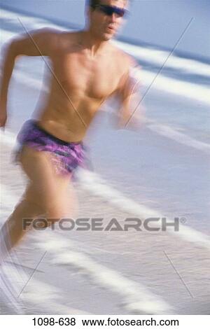 running, Hispanic, beach, jogging, motion, health View Large Photo Image Stock Photo - running, Hispanic, beach, jogging, motion, health. Fotosearch