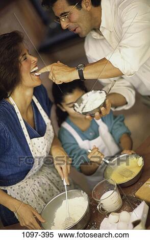 sample, finger, smiling, Hispanic, cooking, ingredient, family View Large Photo Image Stock Photography - sample, finger, smiling, Hispanic, cooking, ingredient, family. Fotosearch