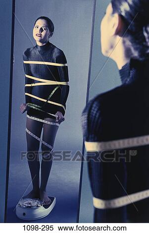 scales, people, reflection, woman, tape, Hispanic, diet View Large Photo Image Stock Photography - scales, people, reflection, woman, tape, Hispanic, diet. Fotosearch