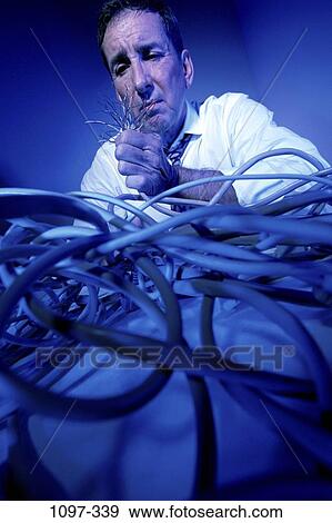 sitting, holding, stress, business, defeat, chaotic View Large Photo Image Stock Photo - sitting, holding, stress, business, defeat, chaotic. Fotosearch