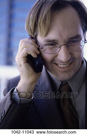 smiling, telephone, eyeglasses, conversation, phone, business View Large Photo Image Stock Image - smiling, telephone, eyeglasses, conversation, phone, business. Fotosearch