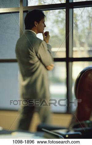 staring, window, business, Middle-aged, contemplation, contemplating View Large Photo Image Stock Photograph - staring, window, business, Middle-aged, contemplation, contemplating. Fotosearch