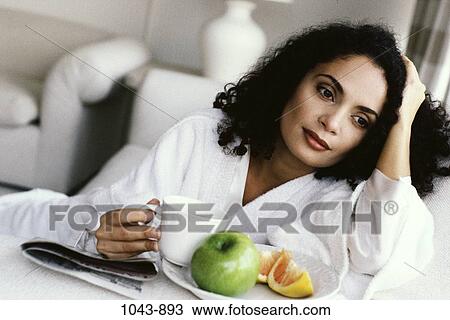 white, eating, woman, morning, newspaper, coffee View Large Photo Image Stock Image - white, eating, woman, morning, newspaper, coffee. Fotosearch