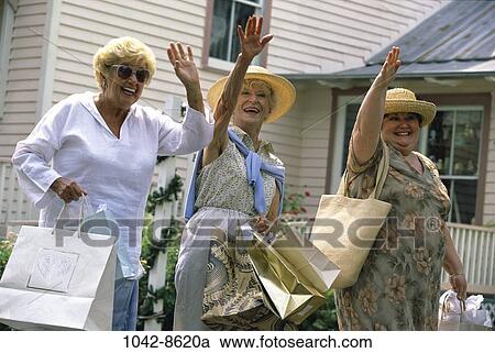 women, people, hats, sunglasses, straw, outdoors, shopping View Large Photo Image Stock Image - women, people, hats, sunglasses, straw, outdoors, shopping. Fotosearch