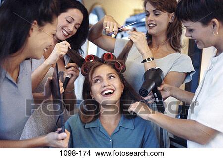 Picture - women, people, Hispanic, hair, teamwork, friends, unity. Fotosearch