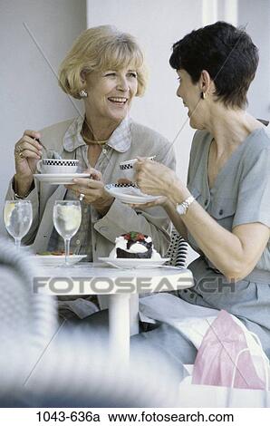 women, people, smiling, coffee, drinking, gossiping, cafe View Large Photo Image Stock Image - women, people, smiling, coffee, drinking, gossiping, cafe. Fotosearch
