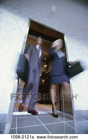 Stock Image - blur, rush, motion, business, hurry, exiting, rushing. Fotosearch