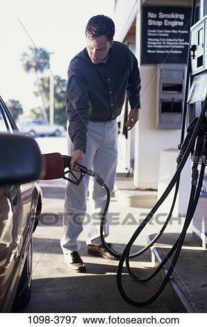 car, outdoors, transportation, brunette, station View Large Photo Image Stock Photo - car, outdoors, transportation, brunette, station. Fotosearch