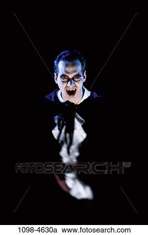 costume, Halloween, horror, fangs, vampire, Dracula, People eccentric View Large Photo Image Stock Image - costume, Halloween, horror, fangs, vampire, Dracula, People eccentric. Fotosearch