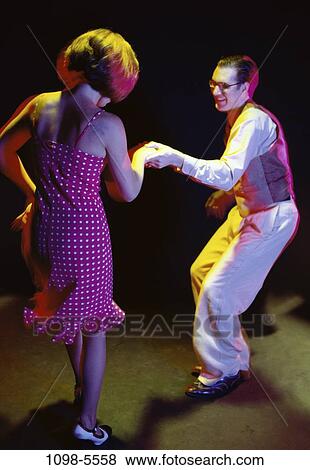 couple, dancing, swing, dance, arts, entertainment, energetic View Large Photo Image Stock Photo - couple, dancing, swing, dance, arts, entertainment, energetic. Fotosearch