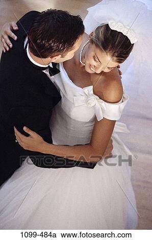 Stock Image - dancing, dance, joyous, beginnings, wedding, tuxedo, bride. Fotosearch
