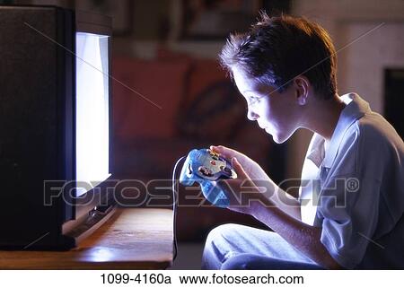 dark, people, playing, staring, boy, television View Large Photo Image Stock Image - dark, people, playing, staring, boy, television. Fotosearch