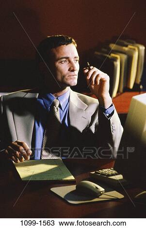Stock Image - desk, computer, individual, equipment, business, Middle-aged. Fotosearch