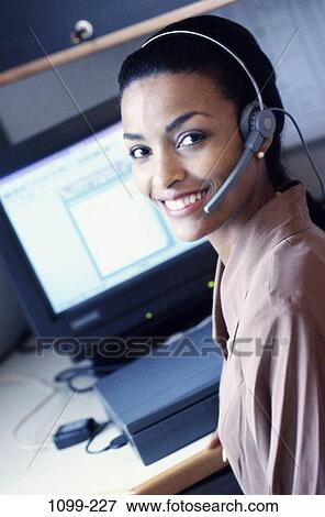 desk, woman, headset, telephone, phone, business, concepts View Large Photo Image Stock Photo - desk, woman, headset, telephone, phone, business, concepts. Fotosearch